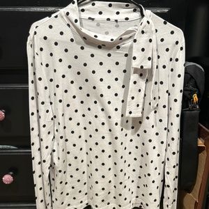 Woman’s polka dot blouse